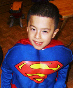 Carlos, a young boy dressed up as Superman, is the inspiration for a special needs poem