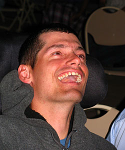 Duane who was diagnosed with infantile epilepsy at 3 months old laughs during a fireworks show