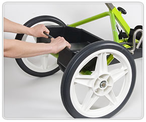 Removing the storage tote from the Rifton Adaptive tricycle