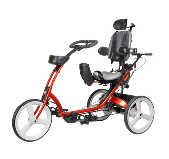 A Rifton Adaptive Tricycle in red
