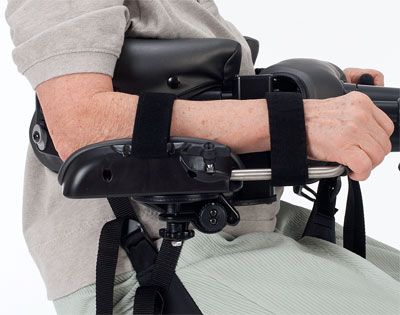 Using the arm prompts to help support body weight for a person with low tone muscular dystrophy during toileting