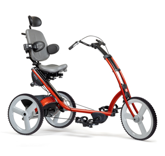 A red Rifton adaptive tricycle