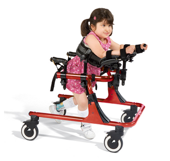 A little girl using walking in an old Rifton Pacer