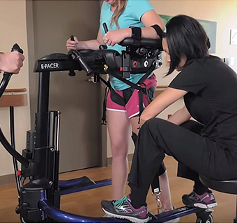 Woman walking in the Rifton E-Pacer